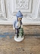 Karstens Antik 
presents: 
Royal 
Copenhagen 
Christmas 
figurine 2002 
Boy with 
Christmas tree 
no. 032