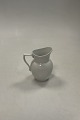 Danam Antik 
presents: 
Royal 
Copenhagen 
White Half Lace 
Creamer No. 394