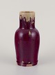 L'Art presents: 
Swedish 
ceramicist.
Unique ceramic 
vase.