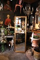 K&Co. presents: 

Old wall 
mirror with 
beveled mirror 
glass, fine 
decorated gold 
frame. Height 
170cm...