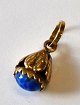 Pegasus – Kunst 
- Antik - 
Design 
presents: 

Small 18th 
carat gold 
pendant, 20th 
century.