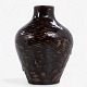 Roxy Klassik 
presents: 

Axel Salto 
/ Royal 
Copenhagen.
A vase in 
partially 
glazed 
chamotte. 
Signed.
1 pc. in ...