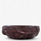 Roxy Klassik 
presents: 
Axel Salto 
/ Royal 
Copenhagen.
Stoneware bowl 
with modeled 
fruits in 
oxblood glaze. 
...