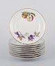 L'Art presents: 
Royal 
Worcester, 
England.
A set of nine 
Evesham 
porcelain 
plates 
decorated with 
fruit and gold 
...