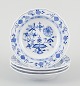 L'Art presents: 
Meissen, 
Germany. A set 
of four small 
Blue Onion 
pattern 
porcelain 
plates.