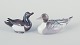 L'Art presents: 
Bing & 
Grøndahl and 
Royal 
Copenhagen, two 
porcelain 
ducks.