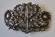 Pegasus – Kunst 
- Antik - 
Design 
presents: 
Belt 
buckle in 
silver, 1918.