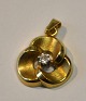 Pegasus – Kunst 
- Antik - 
Design 
presents: 
Red gold 
pendant with 
brilliant, 20th 
century 
Denmark.