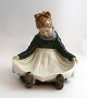 Lundin Antique 
presents: 
Royal 
Copenhagen. 
Porcelain 
figure. Fanø 
girl. Model 
1315. Height 13 
cm. (4 quality)