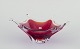 L'Art presents: 
Murano, 
Italy.
Art glass bowl 
in dark red and 
clear glass.