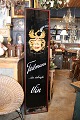 K&Co. presents: 
Decorative, 
old advertising 
sign (Teilmann 
wine) painted 
on glass in a 
wooden frame...
