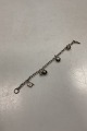 Danam Antik 
presents: 
Sterling 
Silver Bracelet 
by Hermann 
Siersbøl with 
charms
