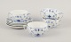 L'Art presents: 
Royal 
Copenhagen Blue 
Fluted Plain.
A set of four 
bouillon cups 
with matching 
saucers.