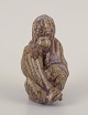 L'Art presents: 
Arne Bang 
(1901-1983), 
figurine of an 
orangutan in 
glazed 
earthenware.