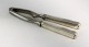 Lundin Antique 
presents: 

Georg 
Jensen. Silver 
cutlery (925). 
Old danish. 
Nutcracker. 
Length 17 cm.