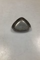 Danam Antik 
presents: 
Just 
Andersen small 
Triangular bowl 
of Pewter, No. 
2643