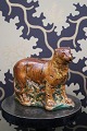 K&Co. presents: 
Antique 
Bornholm 
ceramic piggy 
bank in the 
shape of a 
tiger with old 
original 
painting...