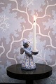 K&Co. presents: 
L. Hjorth 
ceramic angel 
with blue / 
white glaze 
holding a small 
candle...