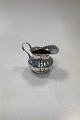 Danam Antik 
presents: 
Russian 
Silver-plated 
milk jug