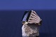 Antik Huset 
presents: 
Men's ring 
in 18 carat 
gold, with 
black onyx. 
Stamped 750. 
Ring size 63.5