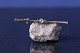 Antik Huset 
presents: 
Beautiful 
gold brooch in 
14 karat gold, 
with clear 
stone. Stamped 
JGA 585.