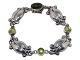 Antik K 
presents: 
Georg 
Jensen sterling 
silver
Bracelet with 
green nephrite 
and peridot 
stones