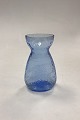Danam Antik 
presents: 
Light Blue 
Flower BulbVase 
from Fyens 
Glass Works