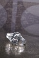 K&Co. presents: 
Old napkin 
ring in silver 
(stamped) with 
the Sandman...
