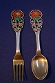 Antikkram 
presents: 
Michelsen 
set Christmas 
spoon and fork 
1925 of Danish 
gilt silver