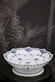 K&Co. presents: 
Royal 
Copenhagen Blue 
Fluted Full 
Lace Bowl on 
Foot.
RC# 1/1023.
1923-28...