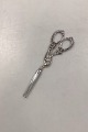 Danam Antik 
presents: 
German 
Umbilical Cord 
Slam/Scissors 
made of silver