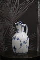 K&Co. presents: 
Royal 
Copenhagen Blue 
Fluted Vinegar 
Jug with Lid 
and Handle.
RC# 1/1180.
From 
1923-28...
