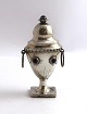 Lundin Antique 
presents: 
Fritz 
Sophus 
Albertus. Newer 
silver 
vinaigrette egg 
with red 
stones. Length 
8.2 cm