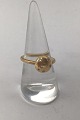 Danam Antik 
presents: 
Dulong 
Fine Jewellery 
18K Gold 
Mushroom Ring 
(7 Diamonds)