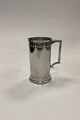 Danam Antik 
presents: 
Just 
Andersen/Royal 
Copenhagen Mug, 
polished pewter 
No. 2204/14