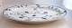 Lundin Antique 
presents: 
Royal 
Copenhagen. 
Blue Fluted 
Half Lace. Oval 
serving 
platter. Model 
535. Length 
47.5 ...