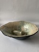 Antik Huset 
presents: 
Ceramic 
Retro 
bowl-dish, in 
brownish and 
green shades.
Ø: 29.5 x 8 
cm.