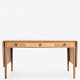 Roxy Klassik 
presents: 
Hans J. 
Wegner / 
Andreas Tuck.
AT 305 - Oak 
desk with two 
flaps and three 
drawers.
1 ...