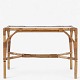 Roxy Klassik 
presents: 
R. Wengler 
/ Wengler.
Coffee table 
in patinated 
bamboo with 
frosted glass 
top.
1 pc. ...