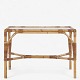Roxy Klassik 
presents: 
R. Wengler 
/ Wengler
Coffee table 
in patinated 
bamboo with 
frosted glass 
top.
1 pc. ...