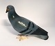 Lundin Antique 
presents: 
Bing & 
Grondahl. 
Porcelain 
figure. Pigeon. 
Model 1911. 
Length 22 cm. 
(2 quality)