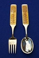 Antikkram 
presents: 
Micelsen 
set Christmas 
spoon and fork 
1967 of Danish 
gilt sterling 
silver