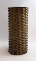 Lundin Antique 
presents: 
Royal 
Copenhagen. 
Aksel Salto. 
Cylindrical 
stoneware vase 
with knobbed 
style. Height 
...