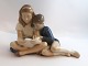 Lundin Antique 
presents: 
Royal 
Copenhagen. 
Porcelain 
figure. 
Children 
reading. Model 
4670. Length 
19.5 cm. ...