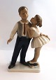 Lundin Antique 
presents: 
Lyngby 
porcelain 
factory. Girl 
and boy. Model 
93. Height 21 
cm. (1 quality)
