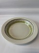 Antik Huset 
presents: 
Royal 
Copenhagen 
Trina Deep 
plate in 
faience
Diameter 18.5 
cm