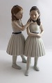 Lundin Antique 
presents: 
Royal 
Copenhagen. 
Porcelain 
figurine. 
Ballet girls. 
Model 135. 
Height 22 cm. 
(1 quality)