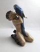 Lundin Antique 
presents: 
Royal 
Copenhagen. 
Porcelain 
figure. Faun 
with parrot. 
Model 752. 
Height 19 cm. 
(1 quality)