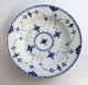 Lundin Antique 
presents: 
Royal 
Copenhagen. 
Blue fluted, 
half lace. Deep 
plate. Model 
565. Diameter 
24.5 cm. (2 ...