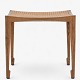 Roxy Klassik 
presents: 
Bernt 
Petersen for 
Wørts.
Stool in Rio 
rosewood with 
crochet hook 
legs and seat 
in ...